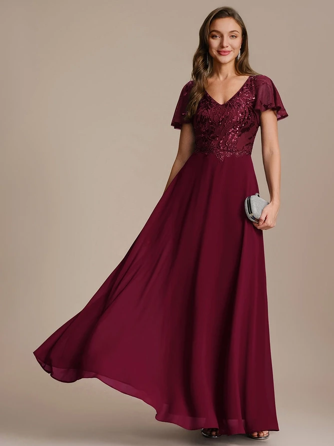 Elegant woman in a black formal gown