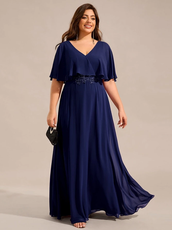 Elegant woman in a taupe beige formal gown